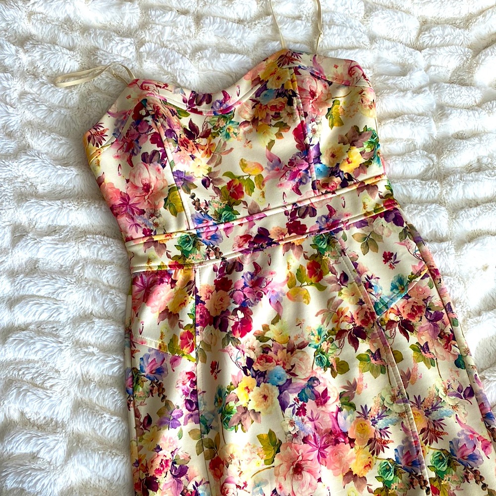 Floral, mid length, zip up dress.